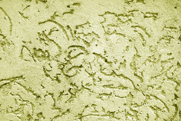 Old wall texture as background in yellow color.