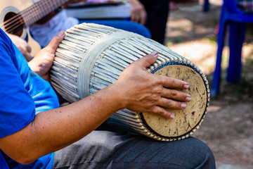 Men playing guitar and drums