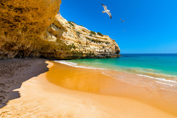 Praia de Albandeira, beautiful coast and beach of Algarve, Portugal. Praia (beach) de Albandeira,...