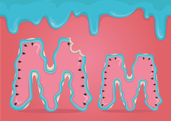 Whole and bitten delicious Latin letters M in the form of cookies with watermelon icing.