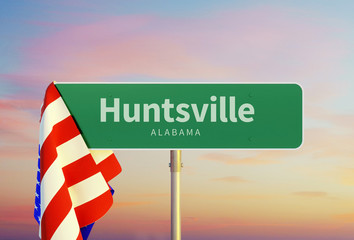 Huntsville – Alabama. Road or Town Sign. Flag of the united states. Sunset oder Sunrise Sky