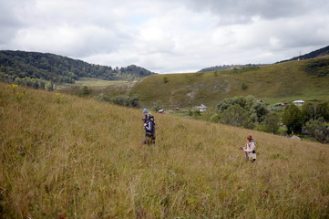 Tourists in the vicinity of the taiga village Generalka Altai Krai
