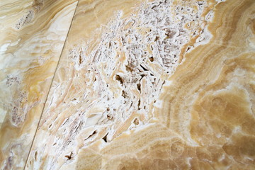Beautiful onyx stone natural texture patterns, design wall, modern architecture, white, yellow and brown colors