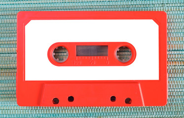 Vintage audio cassette tape with empty label, free copy space,flat lay