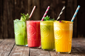 Tasty smoothies served on the rustic wooden table