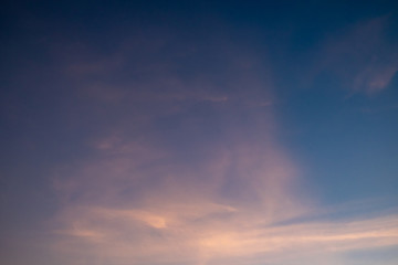 Fototapeta na wymiar Dramatic clouds sky at sunset background.