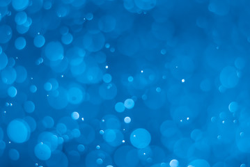 abstract soft bokeh light effect with glow blue background