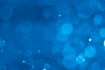 abstract soft bokeh light effect with glow blue background