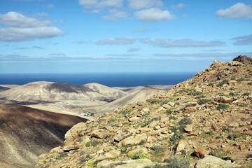Panoramic view over the mountains of Betancuria to Atlantic ocean, Fuerteventura, Canary Islands