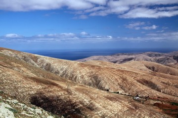 Panoramic view over the mountains of Betancuria to Atlantic ocean, Fuerteventura, Canary Islands