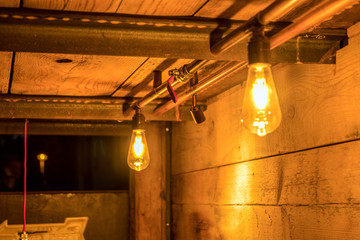 antique light bulbs in an old cellar with many tubes