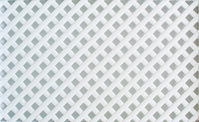 White, wooden, decorative lattice, weave the wooden slats together.