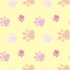 Paw pattern. Silhouettes of paw, cat's feet, dog's footprint. Pastel pink and nude colors on a yellow background. Seamless wallpaper.