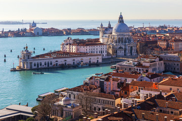 Fototapeta na wymiar Aerial View of the Grand Canal and Basilica Santa Maria della Salute, Venice, Italy. Venice is a popular tourist destination of Europe. Venice, Italy.