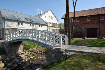 White wood bridge on old town park