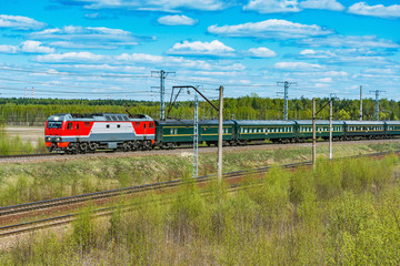 Passenger train from Beijing to Moscow approaches to the station.