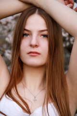 Fototapeta premium portrait of young woman in garden
