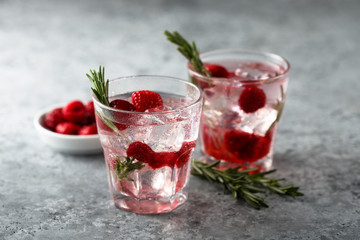 Gin raspberry cocktail with rosemary