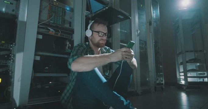 engineer listen to music on headphones at work.