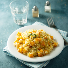 Homemade pumpkin risotto with fresh thyme