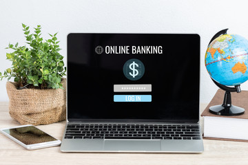 Online banking business and cyber security concept: Laptop computer login account password, dollar sign on screen icons at home office. Ideas for e-Commerce financial of internet bank.