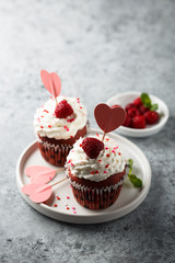 Homemade Red Velvet cupcakes with fresh raspberry