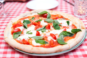 Margherita italian pizza with tomato and basil