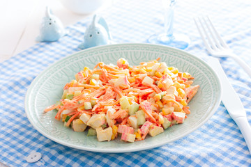 Korean carrot salad with corn, eggs and cucumbers, horizontal
