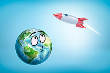 Fototapeta na wymiar 3d rendering of smiley cartoon faced earth globe and red silver rocket on blue background