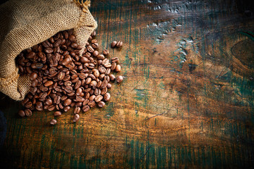 Small hessian bag of fresh roasted coffee beans
