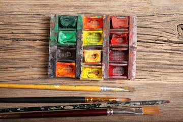 brush and paint on the old board