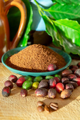 Red mature and dried organic arabica coffee beans, fresh ground coffee, bio coffee farm