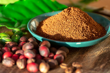 Red mature and dried organic arabica coffee beans, fresh ground coffee, bio coffee farm