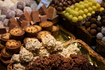 Close up of showcase with different kind of tasty natural sweets