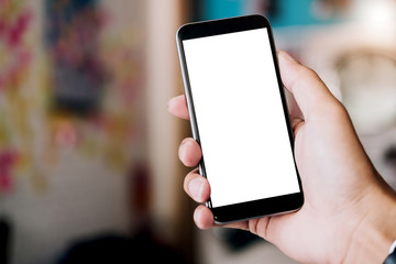 Close-up Of A Woman's Hand Holding Cell Phone With White Blank Screen