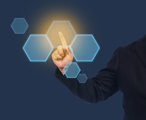 Businessman point to light button on screen .