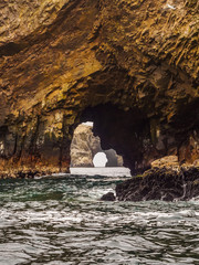 Sea caves in the Ballestas Island in Paracas, Peru