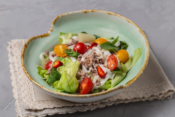 Spicy Thai salad with ground beef and rice noodles