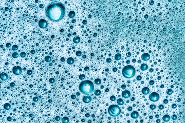 Blued turquoise, black and white Surface of bubbles of foam increased. Series of colors