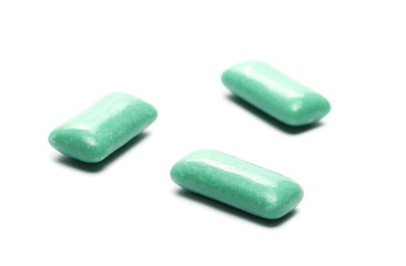 Green chewing gum isolated on white background