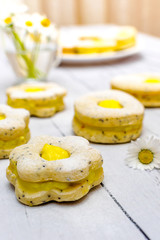 Easter biscuits like eggs with citrus cream