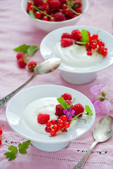 Greek Yoghurt with fresh red berries for breakfast