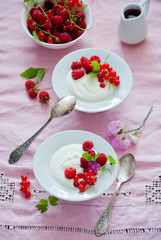 Greek Yoghurt with fresh red berries for breakfast