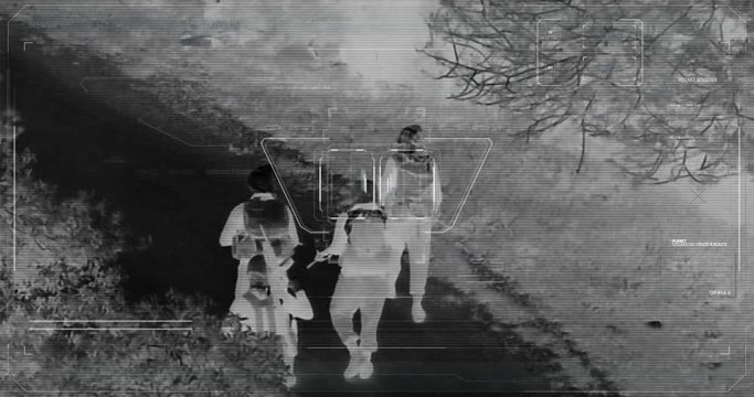 Drone with thermal night vision view of terrorists with camera zooming in