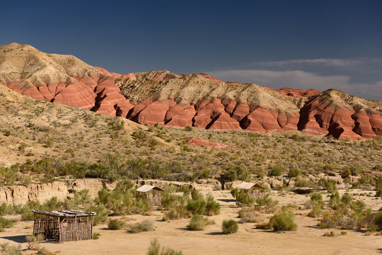 Picnic area at red and white eroded Aktau mountains in Altyn Emel National Park Kazakhstan