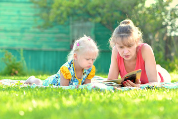 mother with child enjoying together in nature