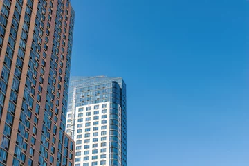 Fotobehang New York Facade of some very tall apartment buildings in Downtown Brooklyn, on a beautiful, sunny summer day, New York City, NY, USA  © Casual-T