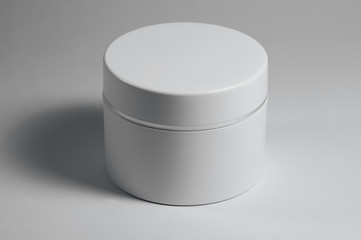 white cosmetic jar