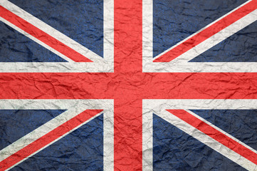 Britain flag on old crumpled craft paper.