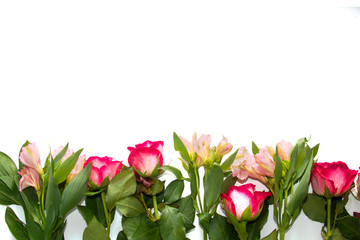 Flower composition on white background with copyspace